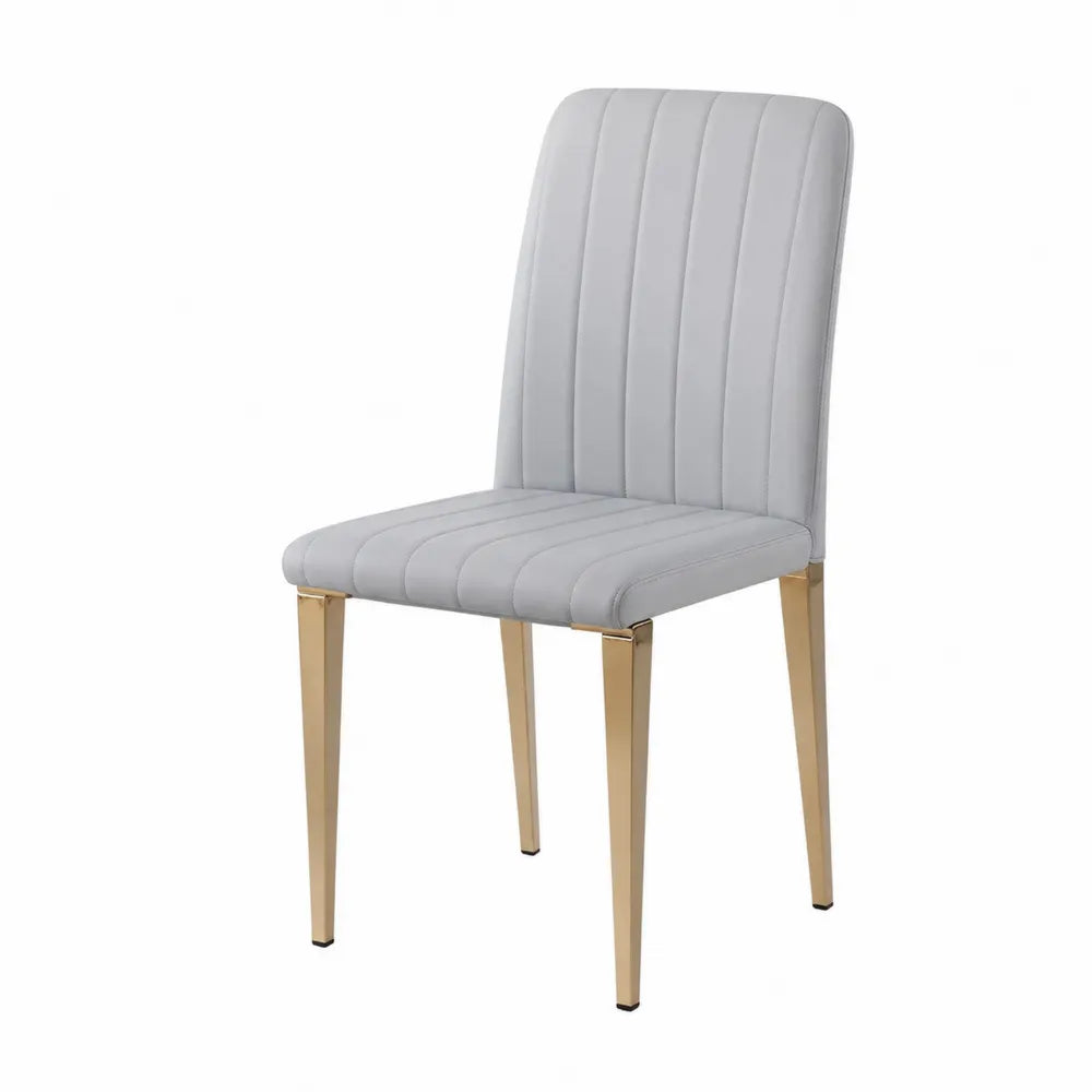 Sedia in ecopelle grigia con gambe in metallo dorato